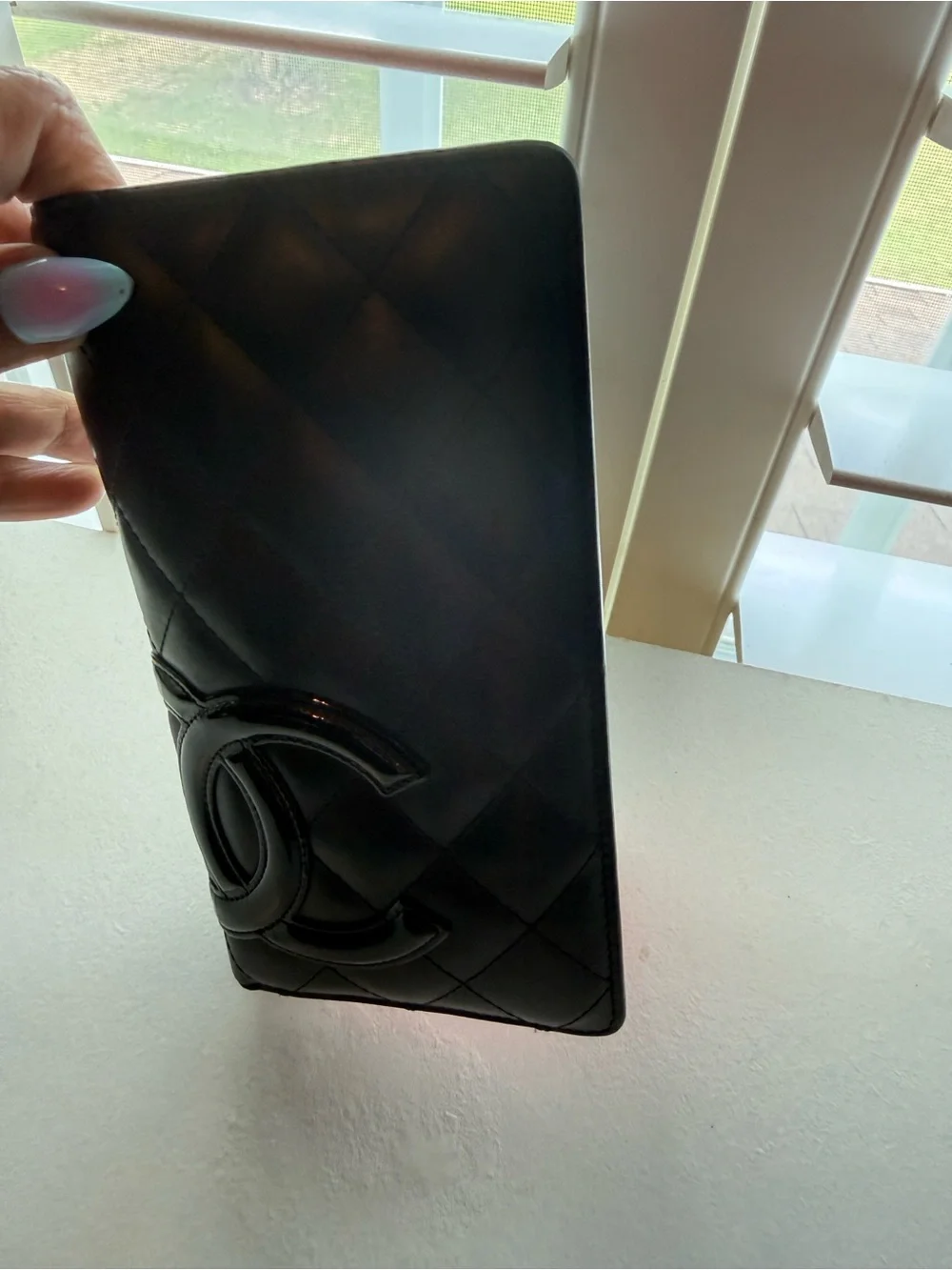 CHANEL Black Quilted Patent CC Phone Case